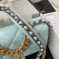 Close up of Gold and silver tone hardware of chanel 19 handbag