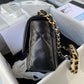 side of black chanel 19 handbag in black lamb skin