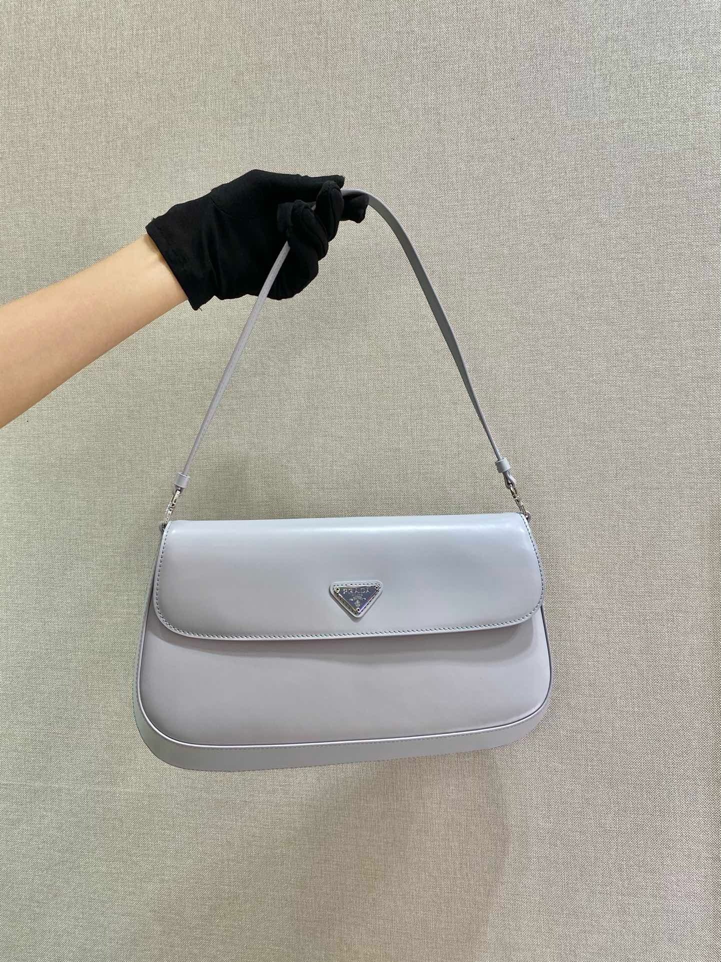 front of white prada cleo brushed leather shoulder bag