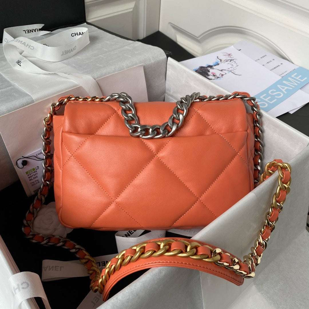 back of Orange chanel 19 handbag in lamb skin and silver hardware