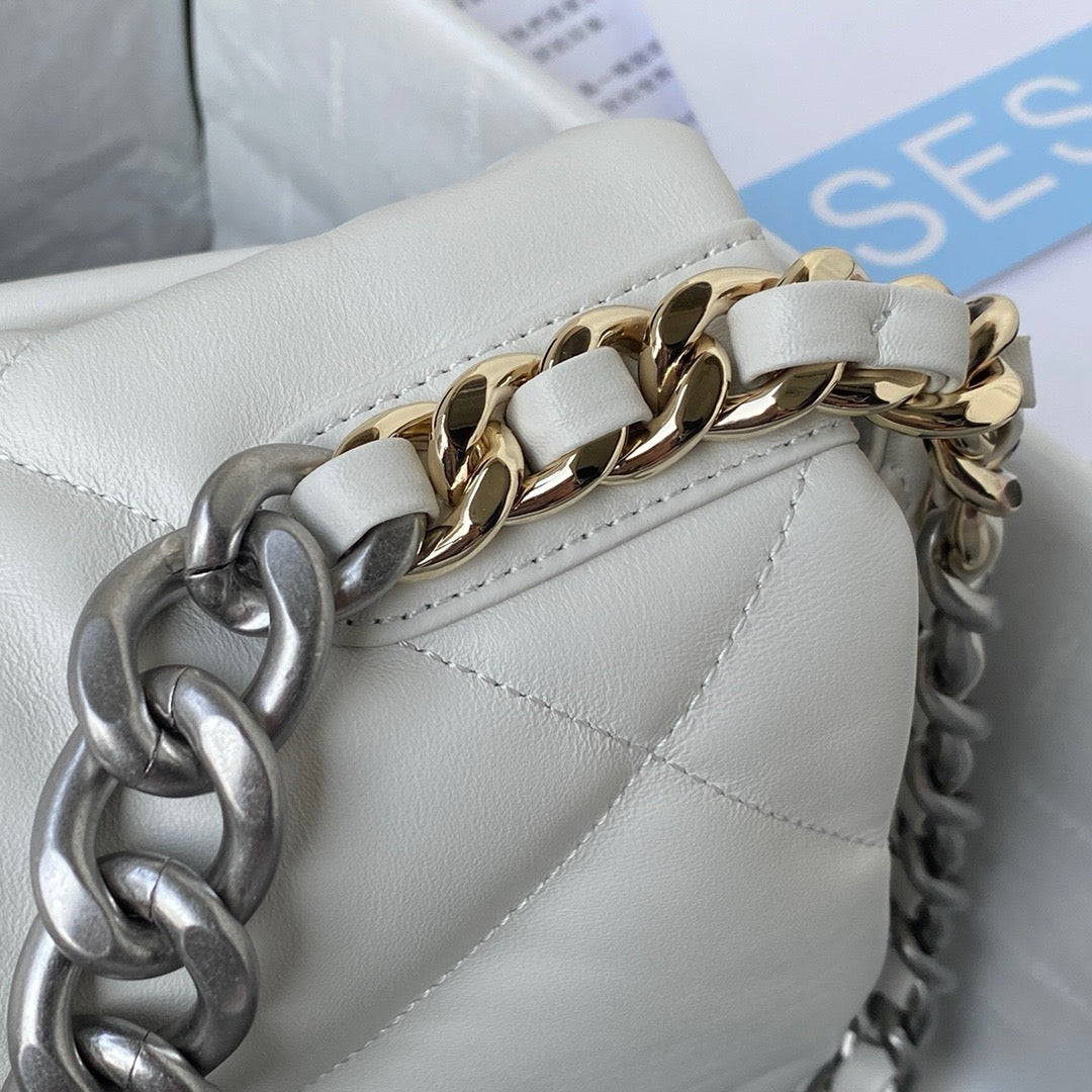 silver and gold chain strap of white chanel 19 handbag in silver hardware lamb skin