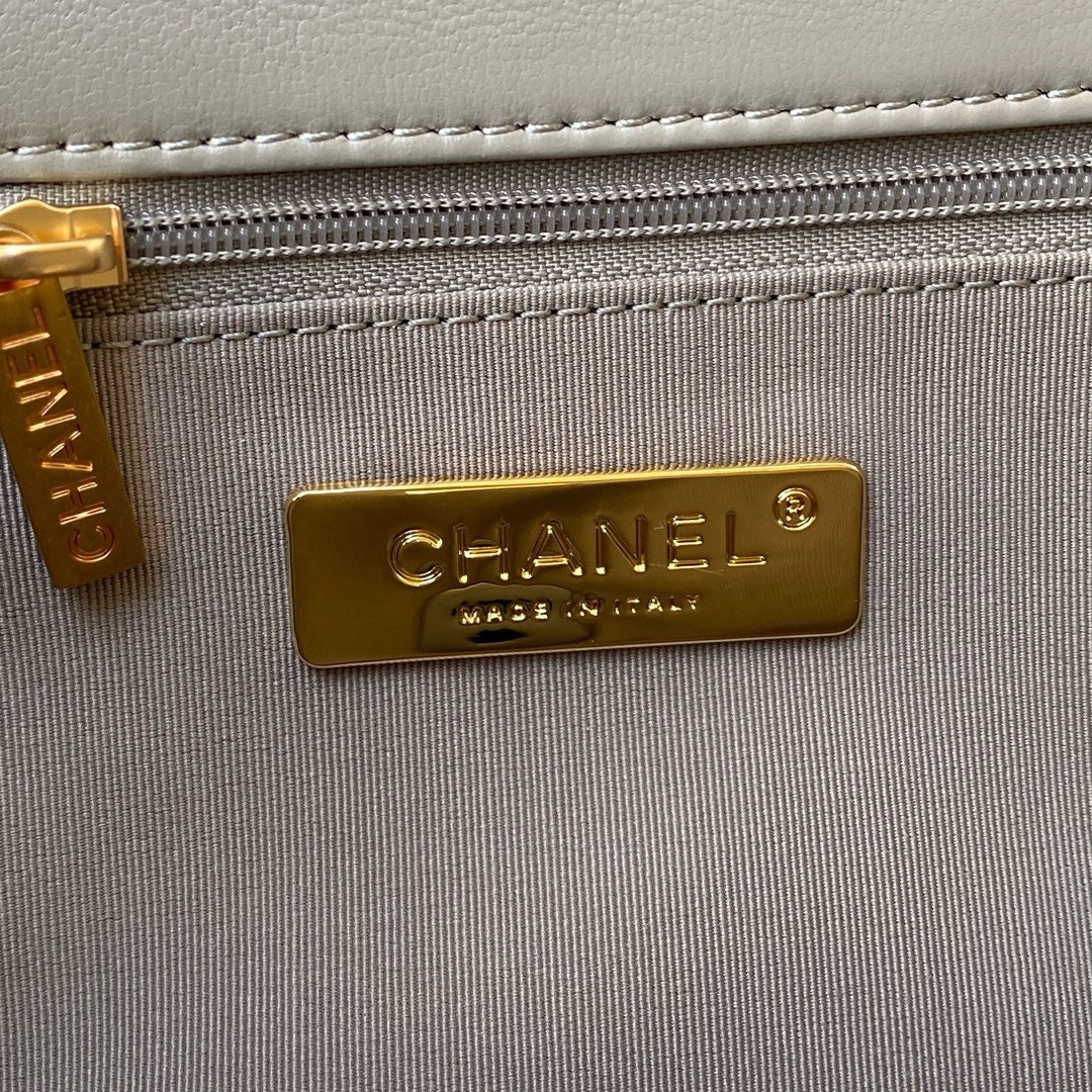 gold chanel logo inside light grey chanel 19 handbag silver hardware lamb skin