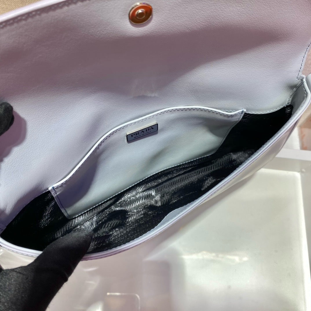 inside of white prada cleo brushed leather shoulder bag