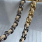 gold and silver tone hardware of chanel 19 handbag strap chain