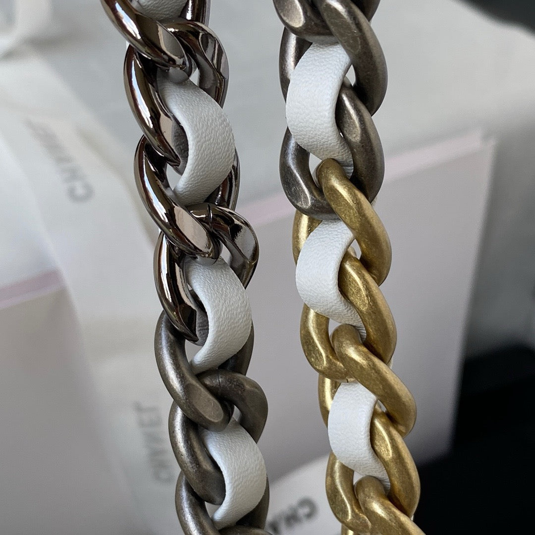 silver and gold chain strap of white chanel 19 handbag gold hardware lamb skin
