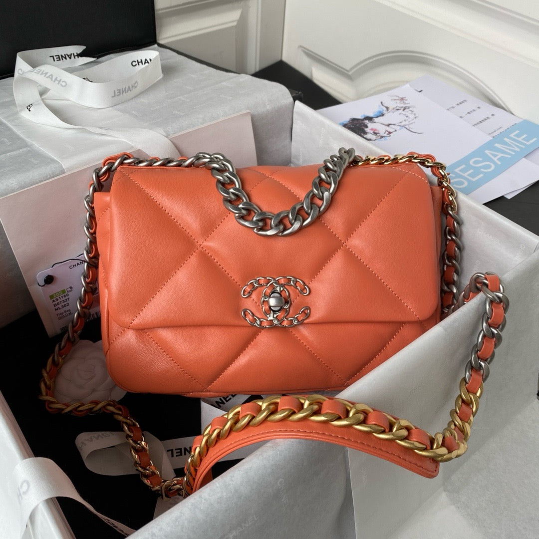 Orange chanel 19 handbag in lamb skin and silver hardware