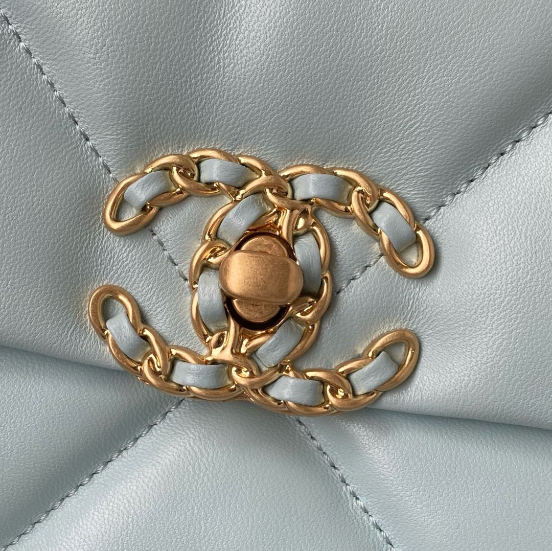 Logo of Chanel 19 Handbag in Aqua colour