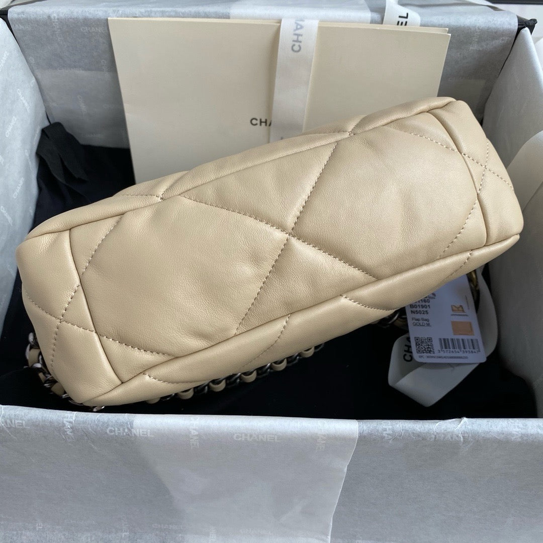 Bottom of Chanel 19 handbag in beige lamb skin