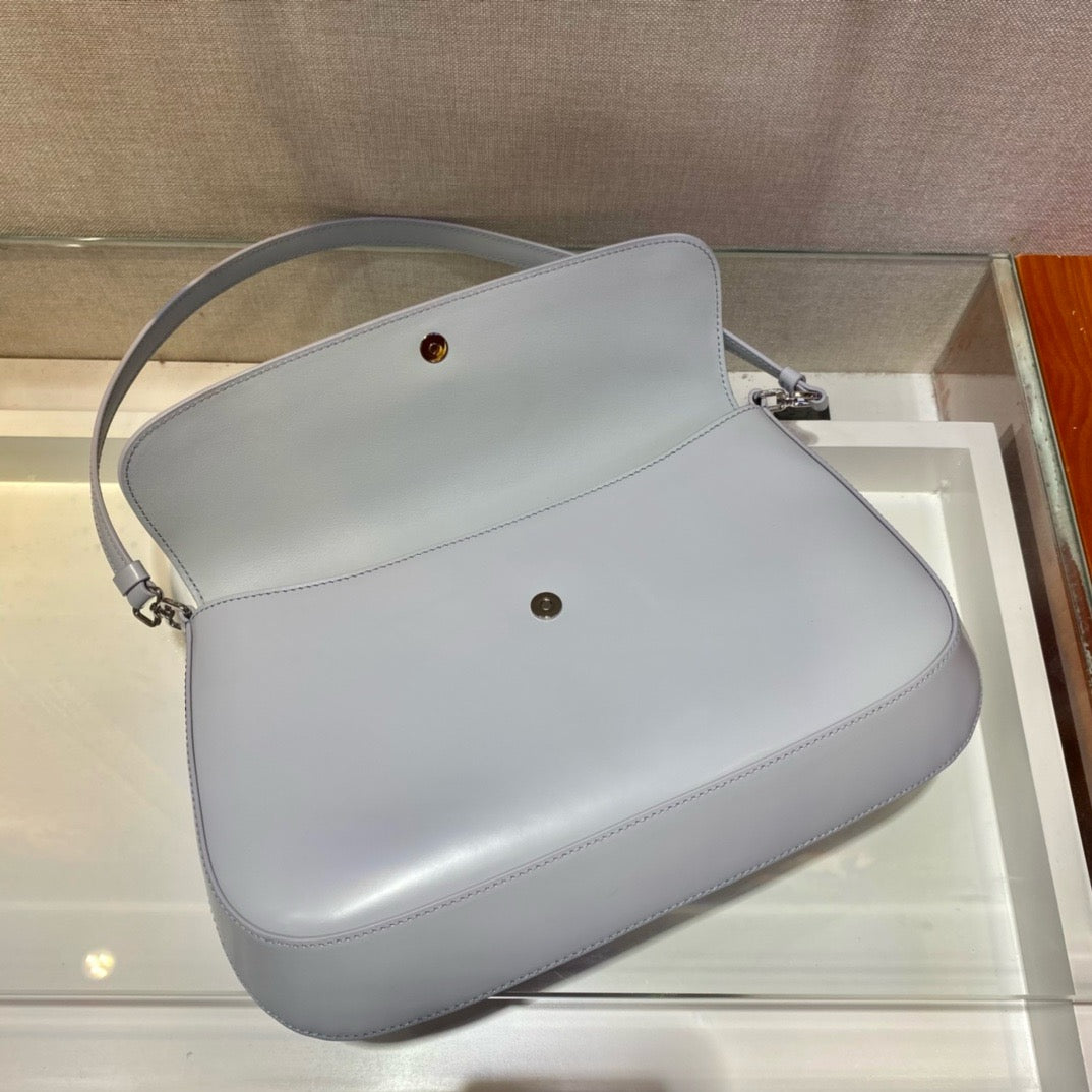 flap opening of white prada cleo brushed leather shoulder bag