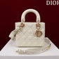 front of white patent leather lady dior bag
