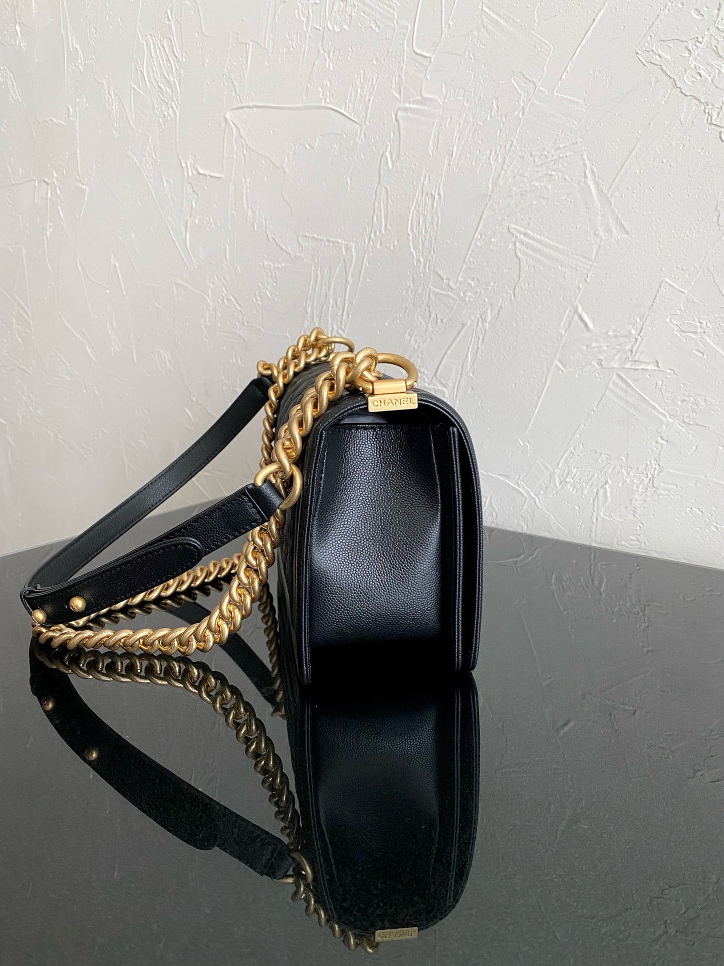 side of boy chanel handbag gold hardware