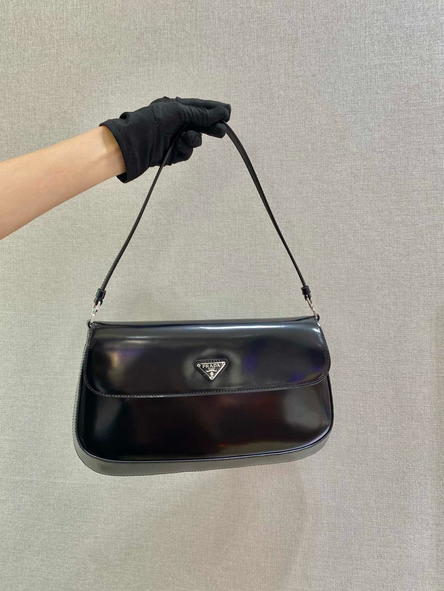front of black prada cleo brushed leather shoulder bag