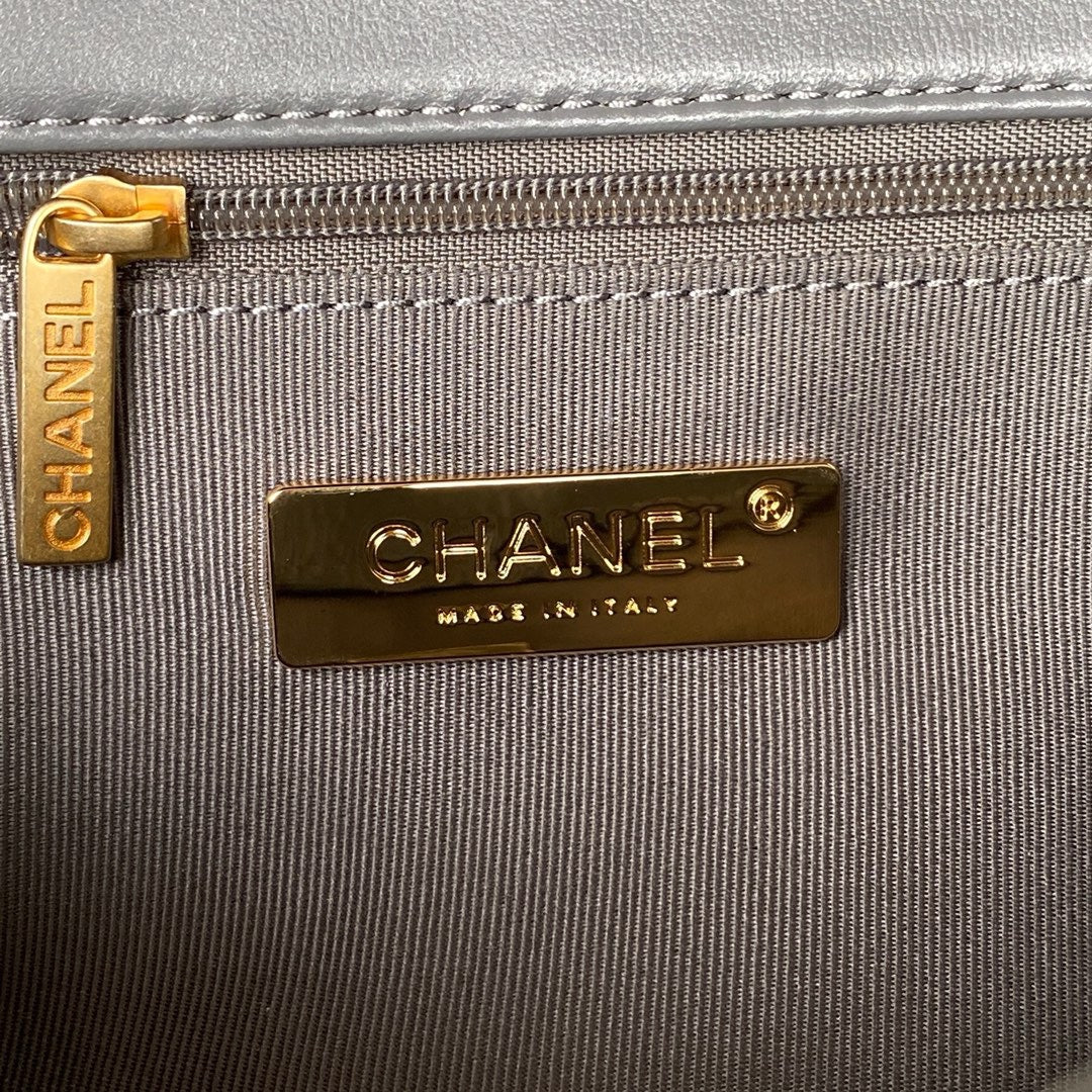 gold chanel hardware inside Grey chanel 19 handbag in lamb skin silver hardware