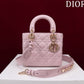 front of pink cannage lamb skin lady dior bag